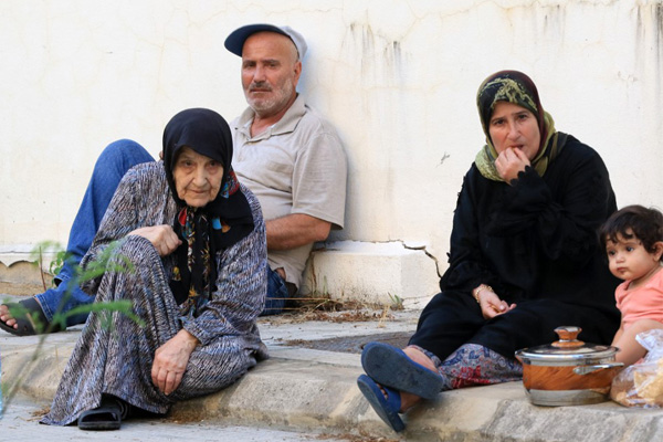  Lebanese family, that fled their village in southern Lebanon, take refuge at a public school.